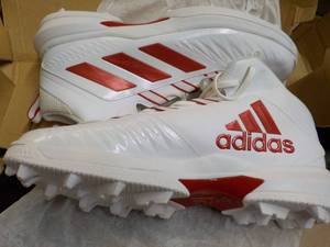 Adidas size 13.5 Football Cleats...