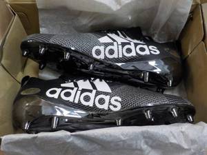 Adidas size 13.5 Football Cleats...