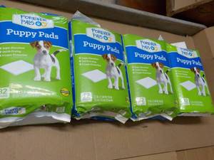 4 pkgs Puppy Pads...