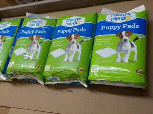 4 pkgs Puppy Pads...