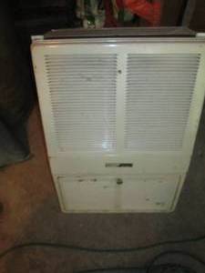 Vintage metal wall hung gas heater...