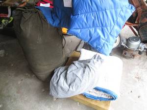 Army duffe full of assorted clothin...