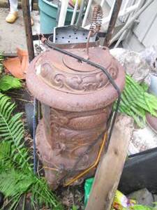 Antique metal wood stove plus hand ...