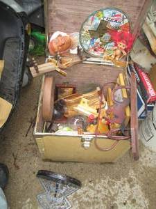 Vintage wood box trunk containing a...
