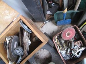 Wood box containing replacement saw...