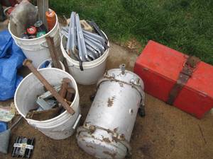 Vintage air compressor tank on whee...