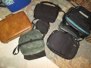Suitcases, messenger bags and other...