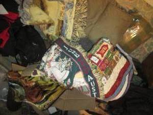 Bundle of blankets and coverings...