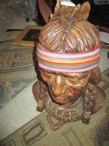 Carved ceramic Indian statue (head ...