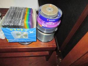 Bundle of DVD-Rs and other discs a...