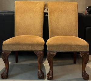 Pair of Carved Upholstered Clawfoot Chairs