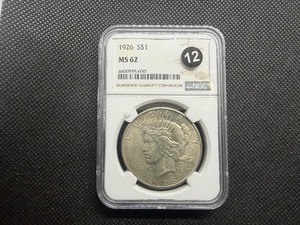 1926 Silver Peace Dollar - NGC MS62 - NGC Price Guide Value for an MS62 is $110