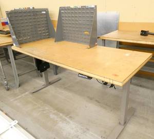 Electric adjustable height work bench with 2 parts bin hangers