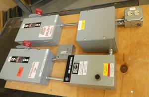 Electrical switches mounted on plywood
