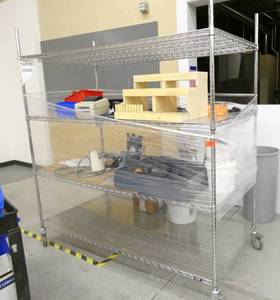 Wire shelving unit and contents including a AO Stereo Star microscope 1 to 6X