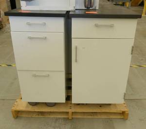 Two heavy steel rolling cabinets 19x24x34 One of each style