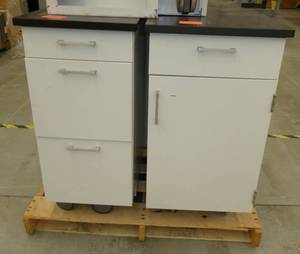 Two heavy steel rolling cabinets 19x24x34 One of each style