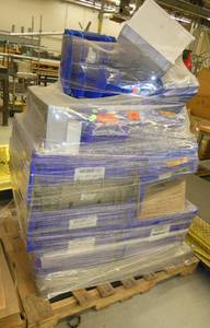 Pallet of empty parts bins
