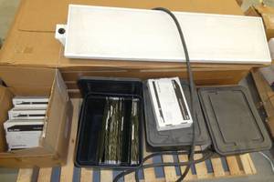 light fixture, 4 new exit signs and 3 portable file boxes