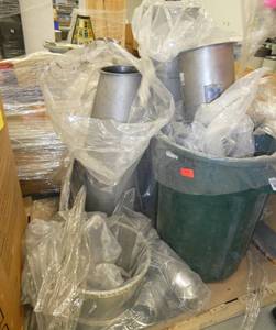Pallet of large used hopper parts used for plastic pellets