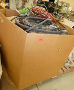 Gaylord pallet with an assembled wire shelf, air hoses and misc