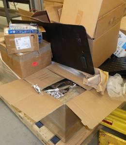 Pallet of misc plastic parts, filament, wireless network cards