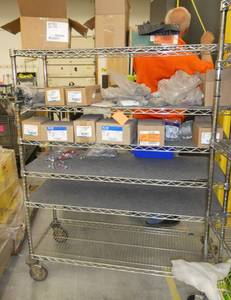 Wire cart on wheels with boxes of Thomas & Betts cable connectors