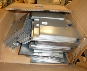 2 boxes full of steel shims