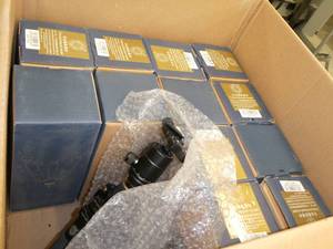 Box of 14 small portable tripods with extending legs