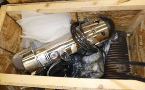 Crate with a CONAIR TL loader unit, control panel and 2 heater units