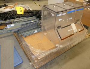 Pallet of shelving, boards are 2x4 ft, plus an acrylic bin