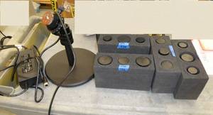 Lot of 12 Schneider-Kreuznach machine automated vision lens and a stand