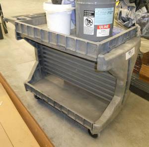Like new Uline mobile workstation 45x24x35 and a pail of dessicant