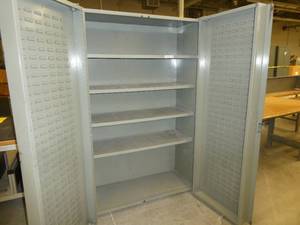 Two door parts storage with parts bin hangers on the side doors