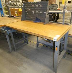 60x30 Workbench with laminate top and steel legs, adjustable height and a parts bin hanger