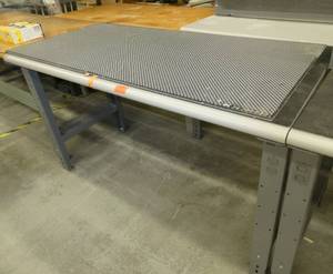 60x30 Workbench with wood laminate top, steel legs, adjustable height, wild mat on top