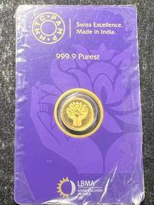 1 GRAM .999 FINE GOLD PAMP ROUND CARDED