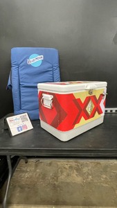 Lot of 2 items Dos Equis cooler and Blue Moon folding chair  backpack