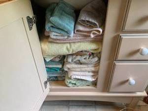 Towels, counter items, scale, waste...