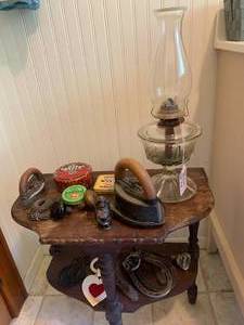Half moon table with vintage items...