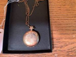 Ladys Elgin pocket watch with chai...