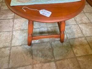 Oval coffee table and vinyl upholst...