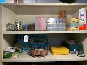 Sewing notions all on top 2 shelve...