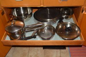 Pots and pans all on top shelf...