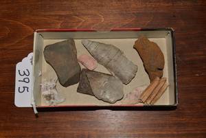 Buffalo tooth, metal piece, rocks a...