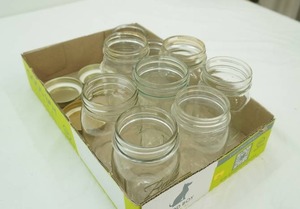 variety of canning jars and lids. pint and half pint