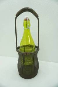 green glass wine bottle & metal mesh bottle holder
