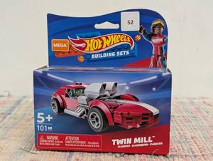 Mega Hot Wheels Twin Mill racecar building set with 101 pieces with micro figure driver figure, toy gift set for ages 5 and up