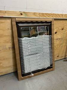 Large wall mirror with a dark frame (28.5 in x 40.5 in)