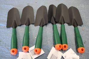 6 Plastic Grip Trowels...